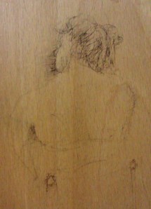 Graffito from Cambridge showing a seated woman's back